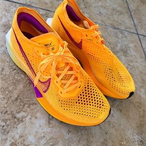 Nike Orange Flyknit Running Shoes with Purple Accents- NEW